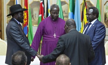Salva Kiir, left, and opposition leader Riek Machar, right
