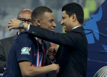 LILLE, FRANCE - MAY 25: Kylian Mbappe of PSG salutes PSG President Nasser Al Khelaifi during the podium ceremony following the French Cup Final between Olympique Lyonnais (OL, Lyon) and Paris Saint-Germain (PSG) at Stade Pierre Mauroy, Decathlon Arena on May 25, 2024 in Villeneuve d'Ascq near Lille, France. (Photo by Jean Catuffe/Getty Images)